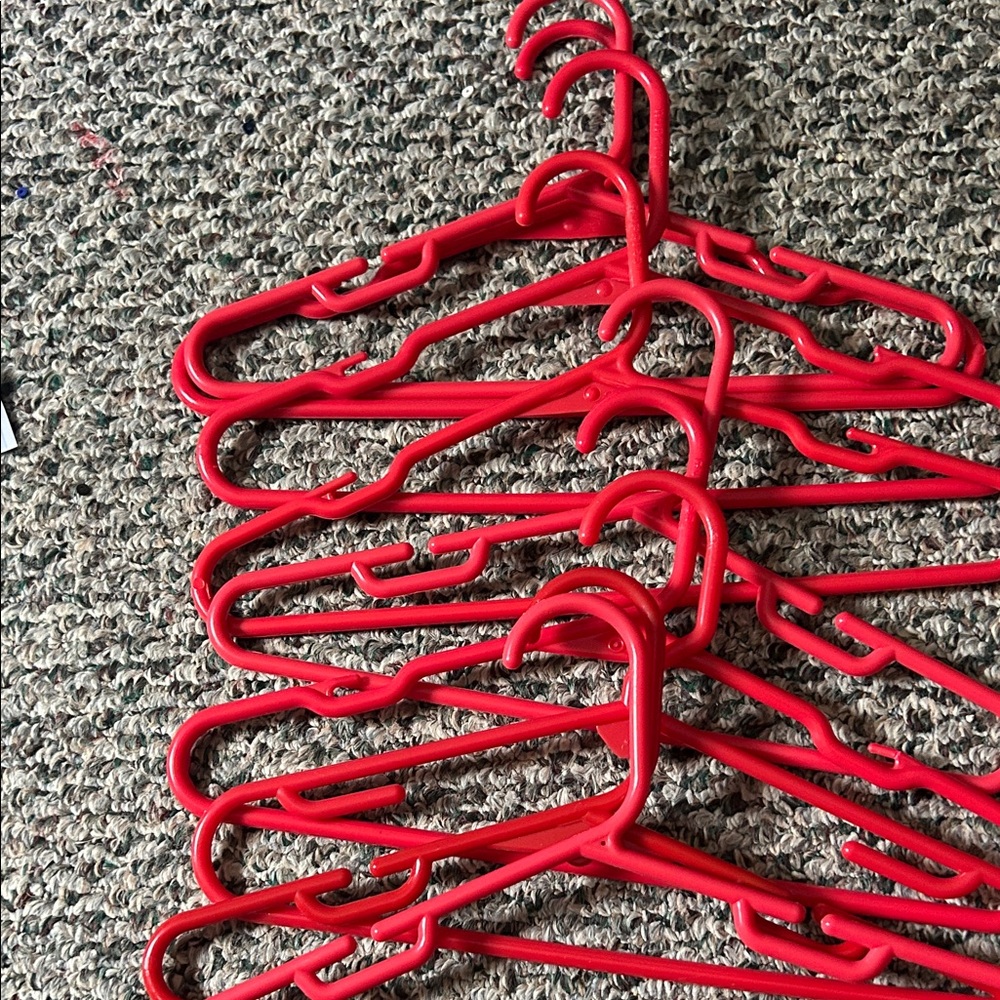 Set of Red Plastic Hangers